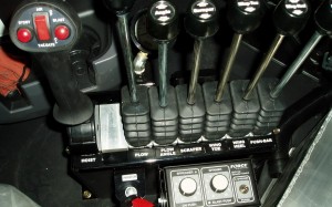 Joystick and Six Control Levers by . 